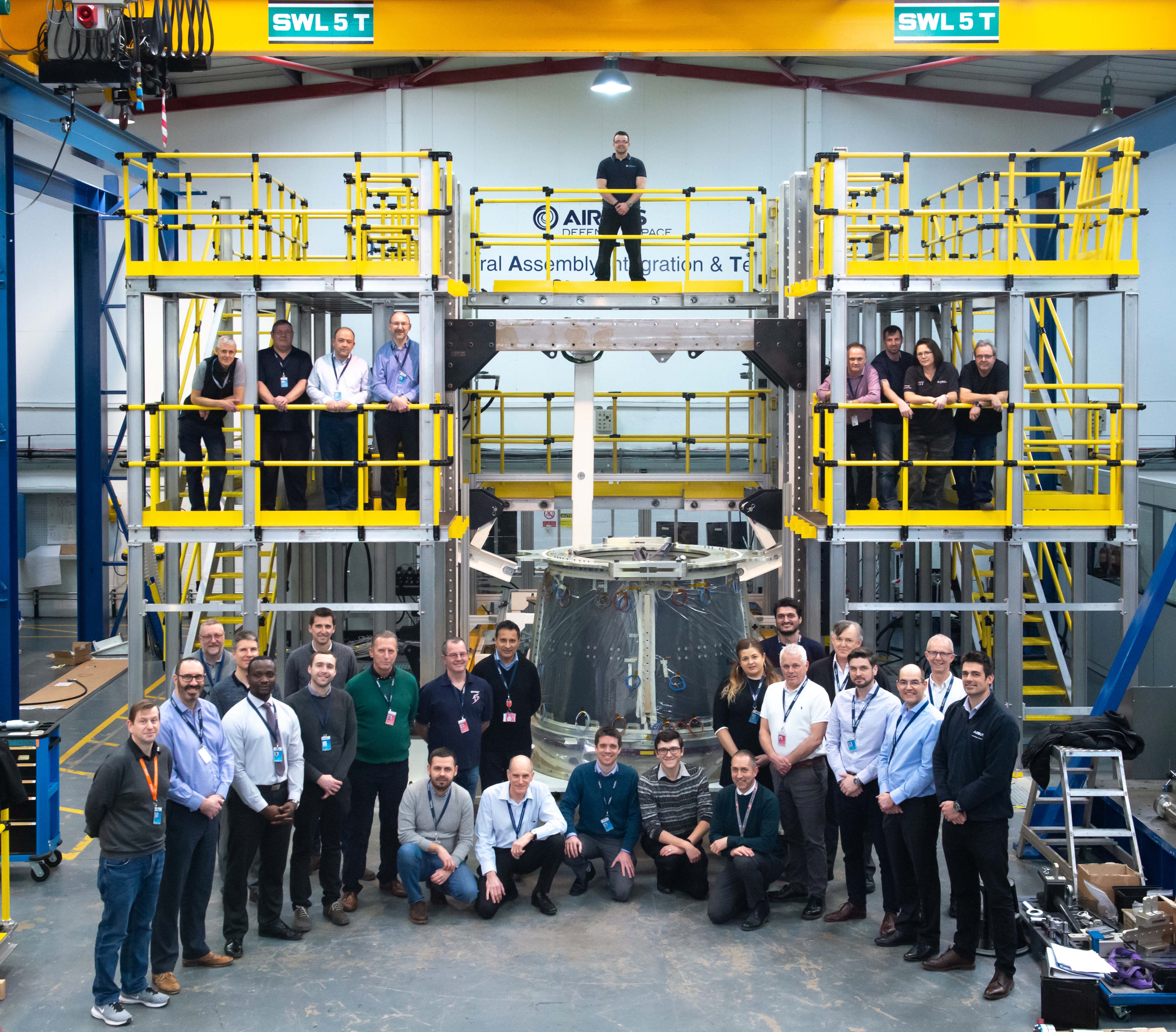 Eurostar Neo central cone with the team at Airbus Defence and Space UK in Stevenage, UK (courtesy of Airbus DS)