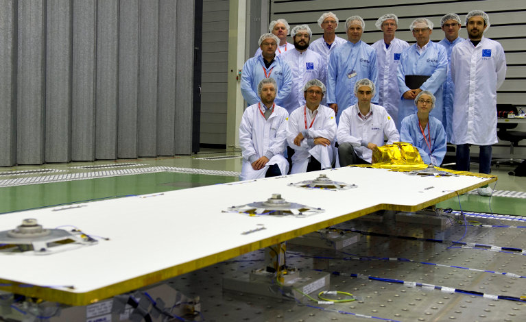 Test team, with representatives of EHP, Airbus DS, ETS and ESA, and the Qualification Model of the Deployable Panel Radiator