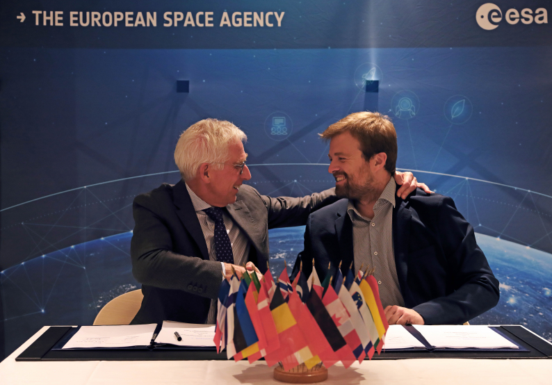 Javier Benedicto, Acting Director of ESA’s Connectivity and Secure Communications, and Emile de Rijk, CEO and founder of Swissto12, complete the signature at ESA Headquarters in Paris.&quot;&quot;