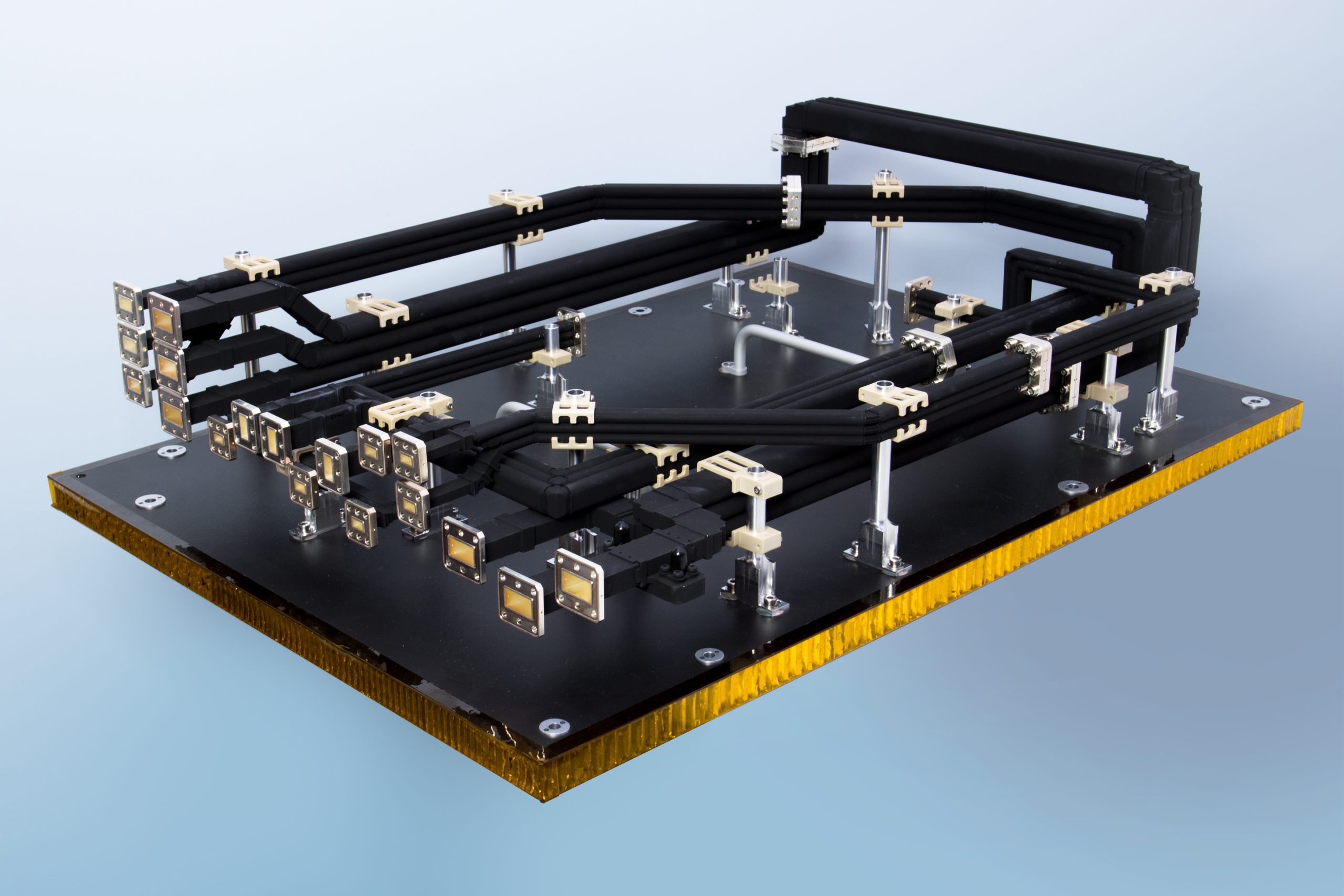 Integrated waveguide harnesses for the Ku-Rx, Ka-Tx and Ka-Rx frequency bands